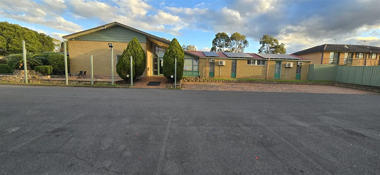 The motel and grounds in the evening